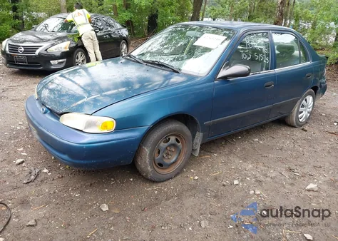 2000 Chevrolet Prizm из США, поврежденный, VIN 1Y1SK5289YZ401584
